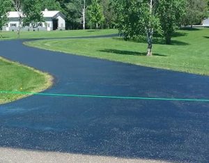 curvy driveway with new sealcoating